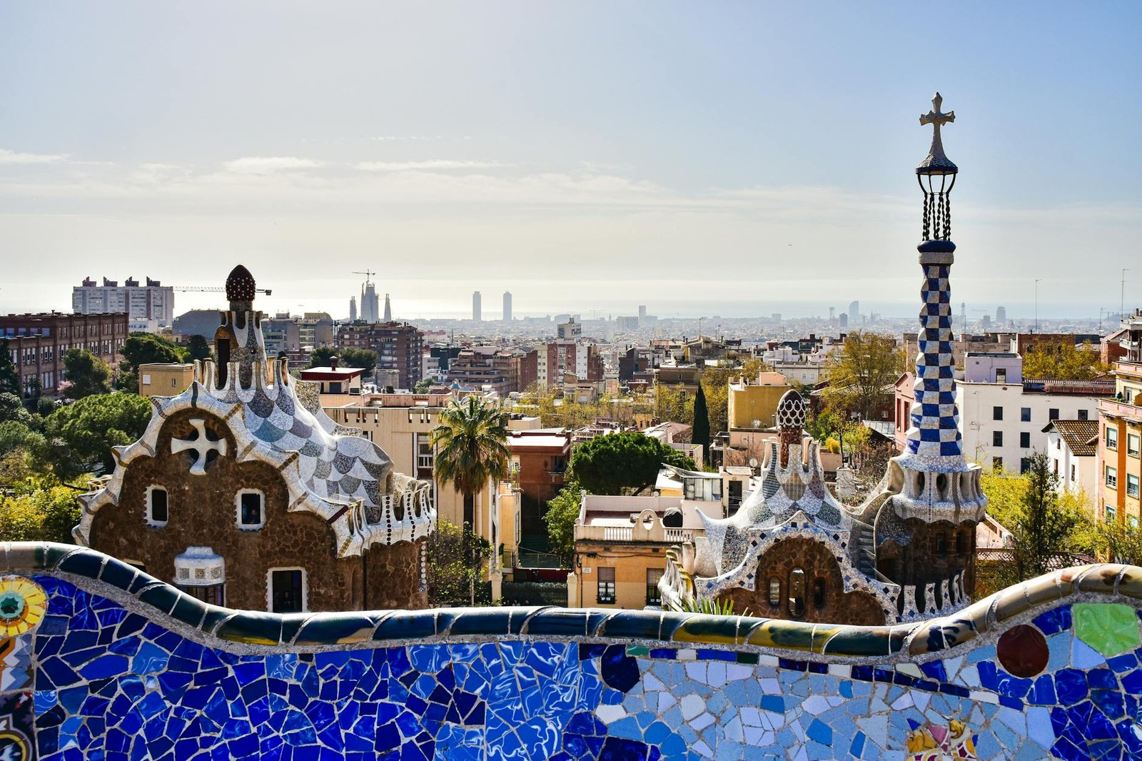 A stunning cityscape of Barcelona from Park Güell, capturing unique architecture and vibrant urban life.